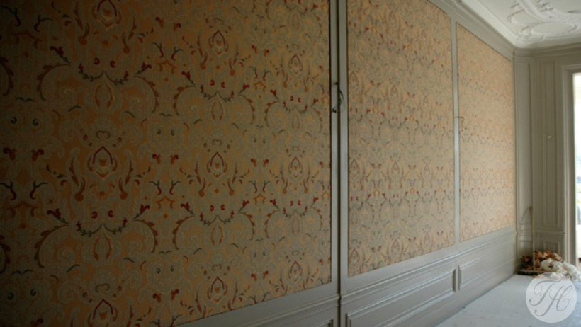 stoffen wandbespanning voor warmte en geluidsisolatie stijlkamer Haringvliet Rotterdam